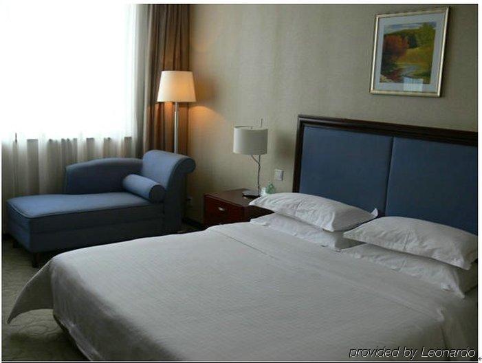 New Land Business Hotel Wuhan Room photo